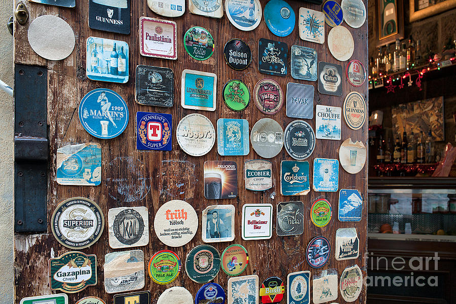 Beer Photograph - Various Vintage Table Coasters Inside Pub Arezzo by Corina Daniela Obertas