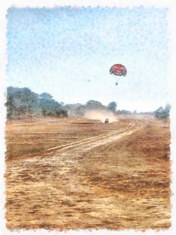 Vehicle and parasailing over land Photograph by Ashish Agarwal