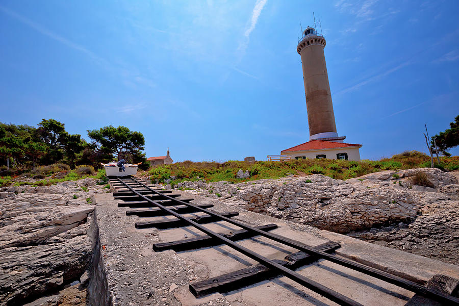 Veli Rat lighthouse and boat extraction tracks Photograph by Brch Photography