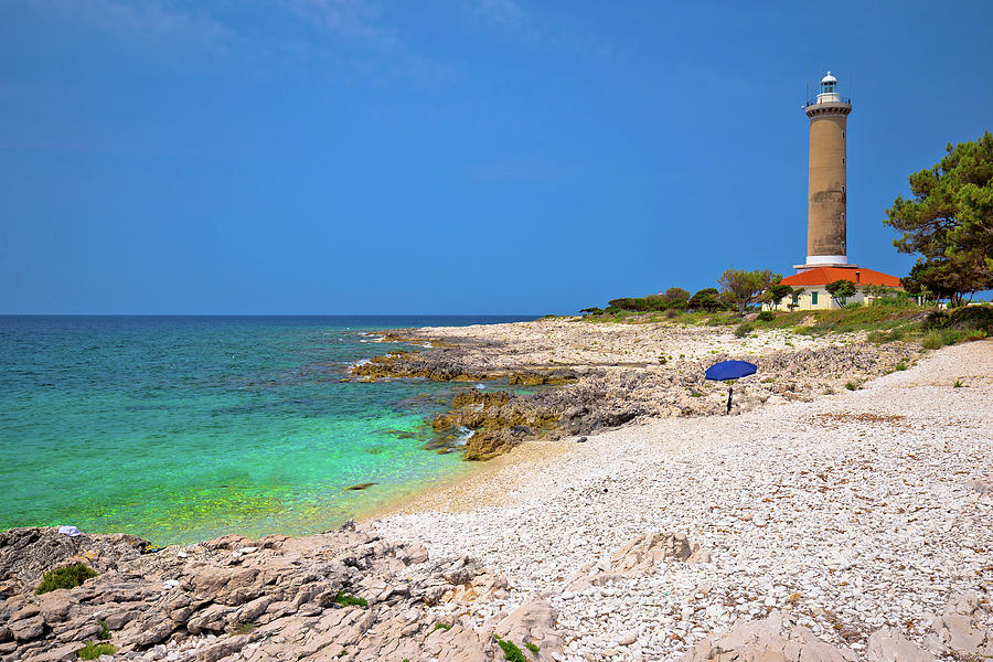 Veli Rat lighthouse and turquoise beach view Photograph by Brch Photography