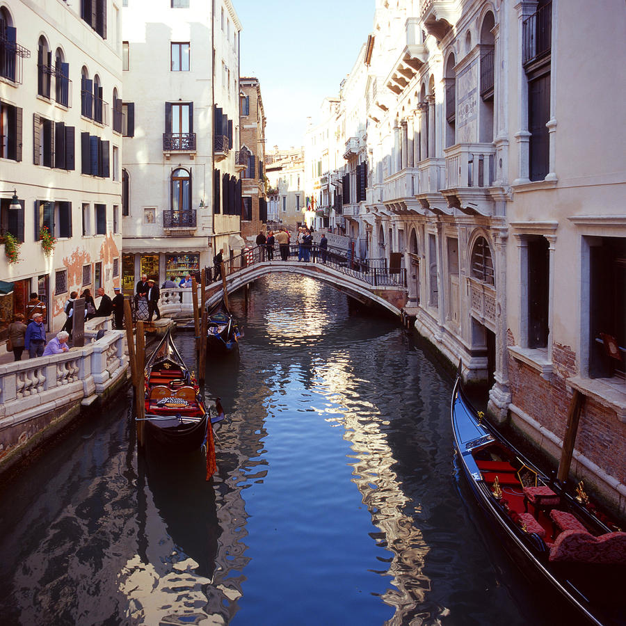 Venice canal with gondolas Photograph by Paul Cowan