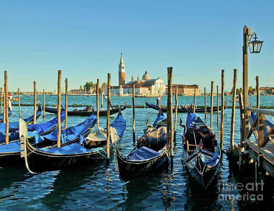 Venice gondolas - evening Photograph by Maria Rabinky