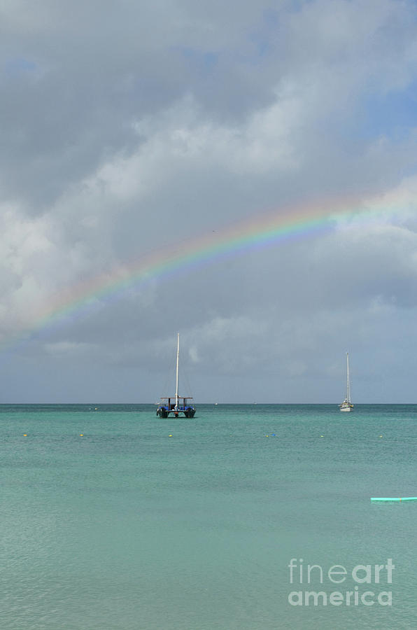 Very Pretty Rainbow with a Catamaran Anchored Photograph by DejaVu Designs