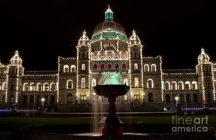 Victoria Parliament Buildings and Fountain at Christmas Photograph by Maria Janicki