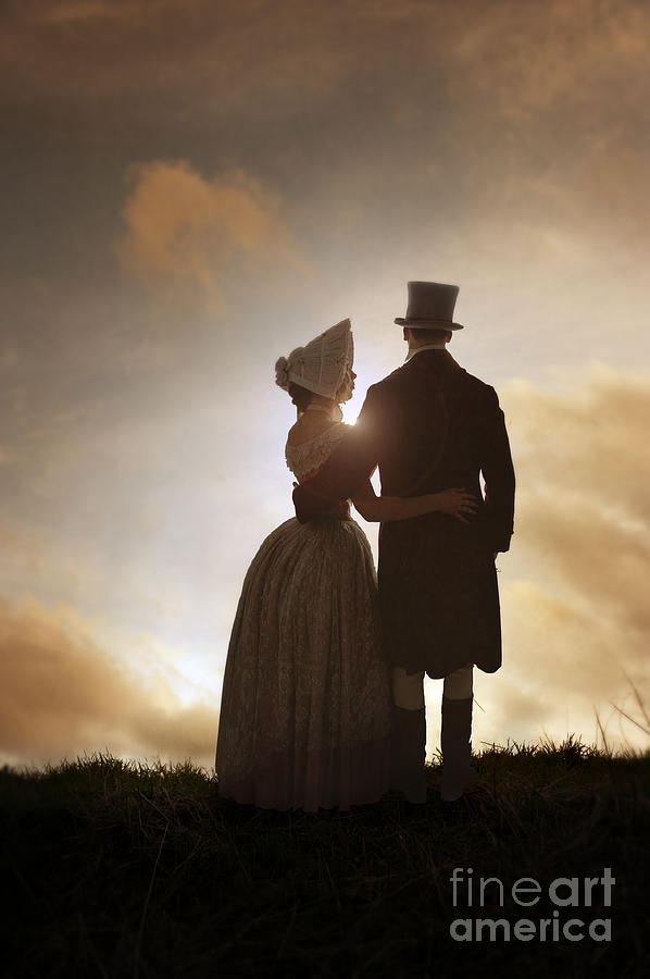 Victorian Couple In Silhouette At Sunset Or Sunrise Photograph by Lee Avison