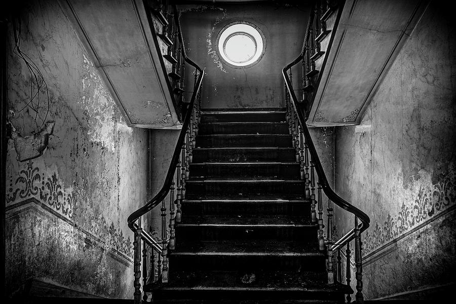 Stairs to the attic - BW urban exploration deserted castle Photograph by Dirk Ercken