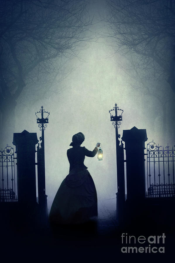 Victorian Woman Entering A Gateway At Night In Fog Photograph by Lee Avison