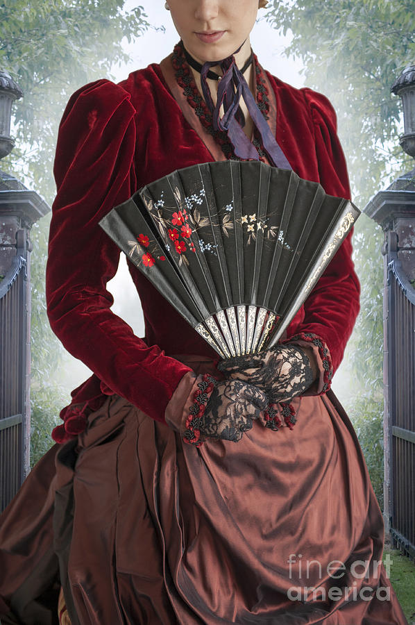Victorian Woman In A Crimson Velvet Dress With Fan Photograph by Lee Avison