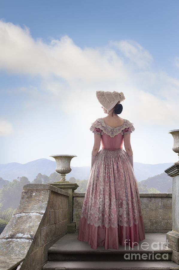 Victorian Woman In A Pink Dress Admiring The View Photograph by Lee Avison