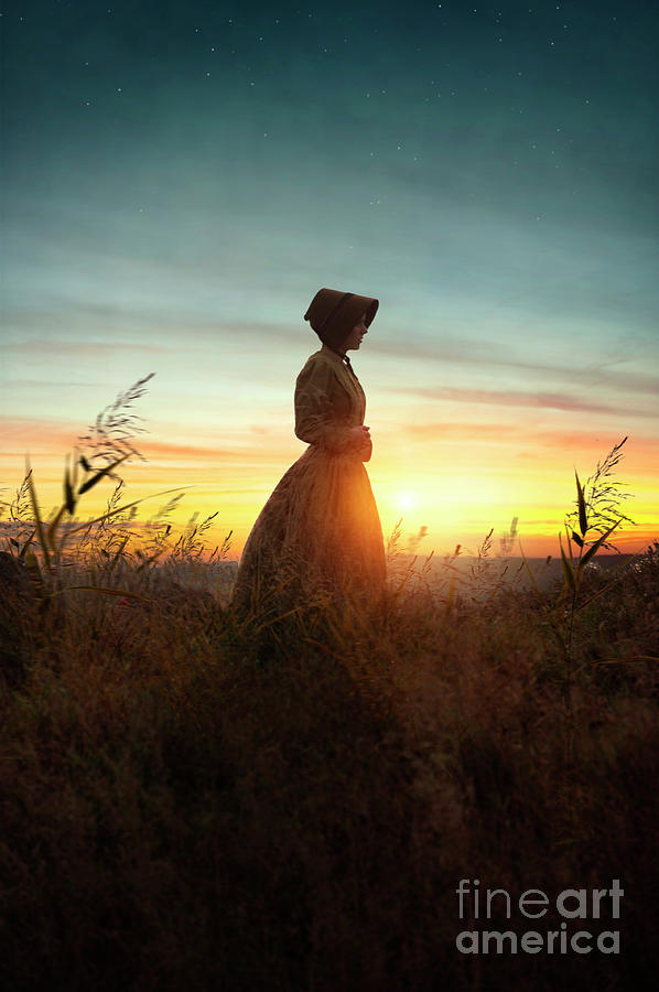 Victorian Woman In Silhouette At Sunset Photograph by Lee Avison