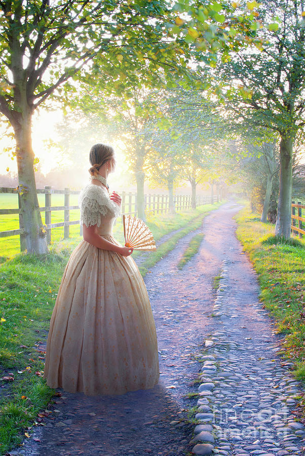 Victorian Woman On A Rural Path At Sunset Photograph by Lee Avison
