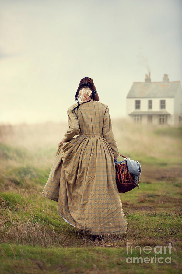 Victorian Woman Walking Towards A Cottage On The Moors Photograph by Lee Avison