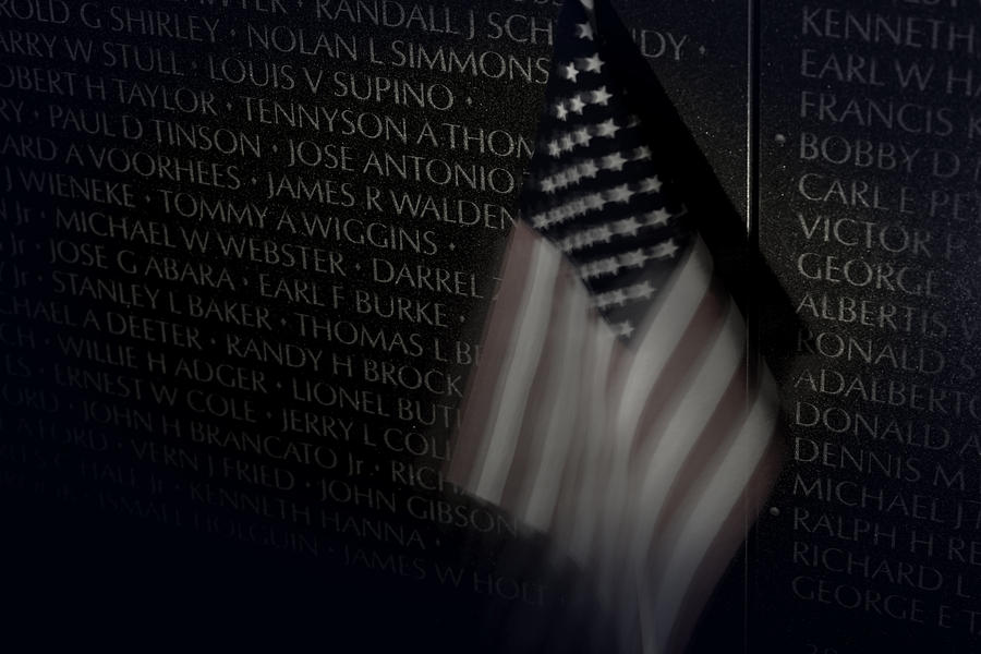 Vietnam Memrial Wall with US Flag Photograph by Art Whitton