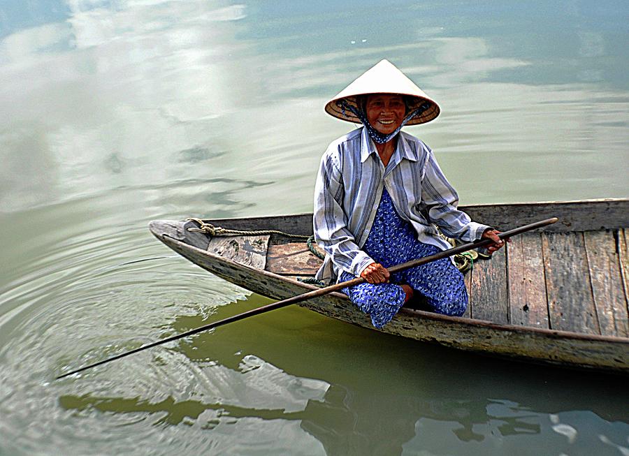 Vietnamese Boat Woman. Photograph by John Hughes