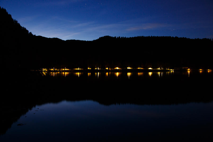 View across Lake Bled at night Photograph by Ian Middleton