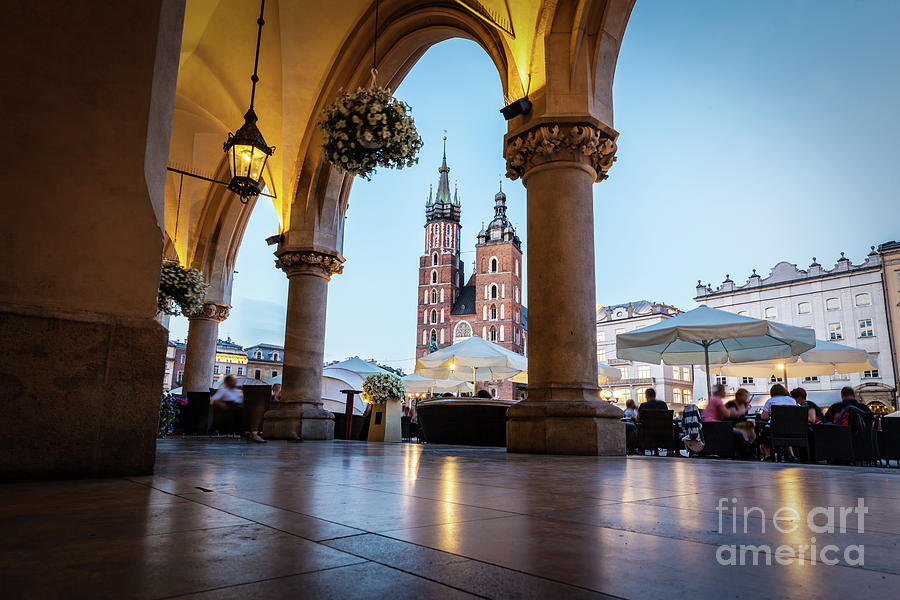 View from the Cloth Hall to the Cracow main market square and St. Marys Basilica Photograph by Michal Bednarek