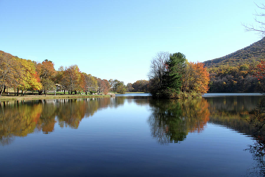 View of Abbott Lake with trees on island, in autumn Photograph by Emanuel Tanjala
