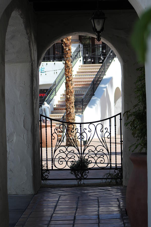 View of Art District Courtyard Through Stucco Doorway Photograph by Colleen Cornelius