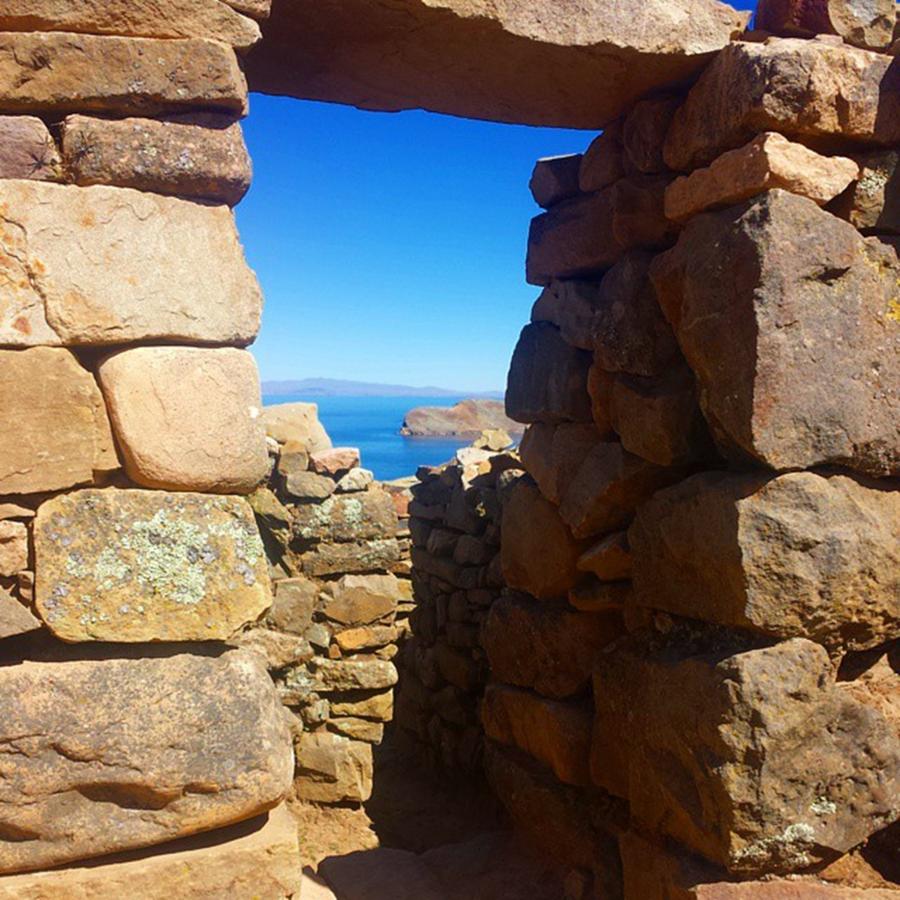 Travel Photograph - View Through Inca Ruins On The Island by Dante Harker