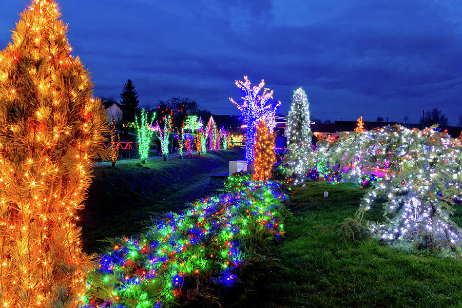 Village in colorful christmas lights Photograph by Brch Photography