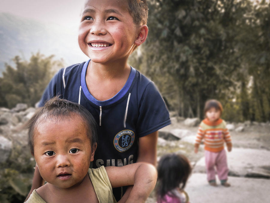 Village Play Photograph by Paki OMeara Village Play Photograph by Paki OMeara