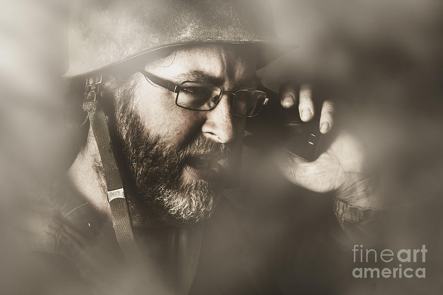 Vintage army soldier with modern mobile technology Photograph by Jorgo Photography