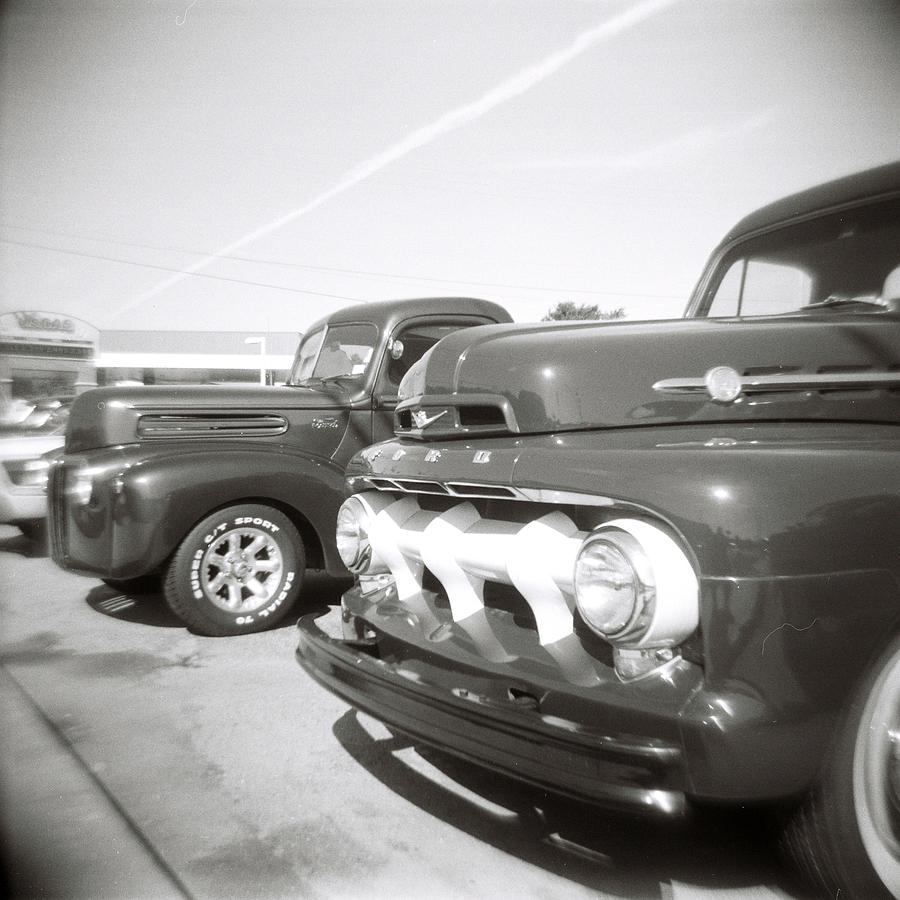Vintage auto lot Photograph by Jeff Folger