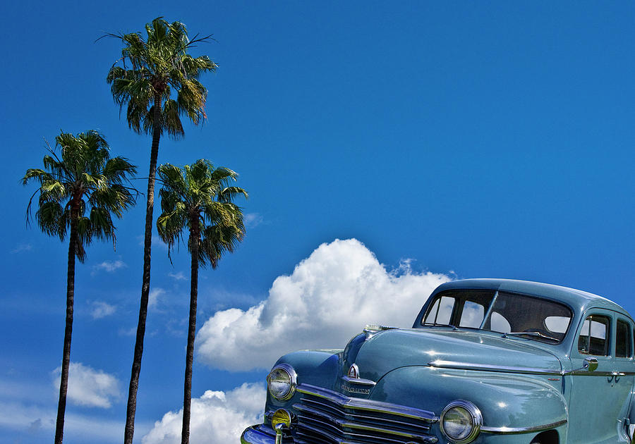 Vintage Blue Plymouth Automobile against Palm Trees Photograph by Randall Nyhof
