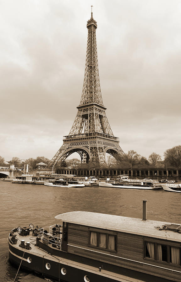 Vintage Boat Moored on the Seine River beneath Eiffel Tower Paris France Sepia Photograph by Shawn OBrien