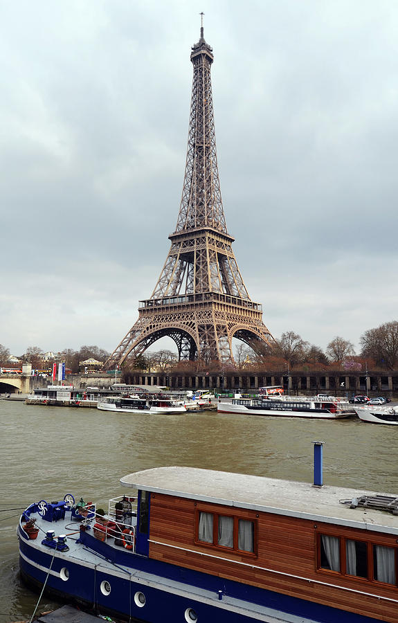 Vintage Boat Moored on the Seine River beneath Eiffel Tower Paris France Photograph by Shawn OBrien