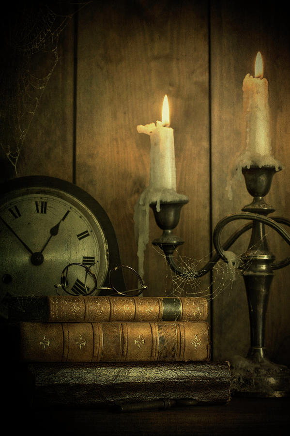 Vintage Books With Candles And An Old Clock Photograph by Ethiriel Photography