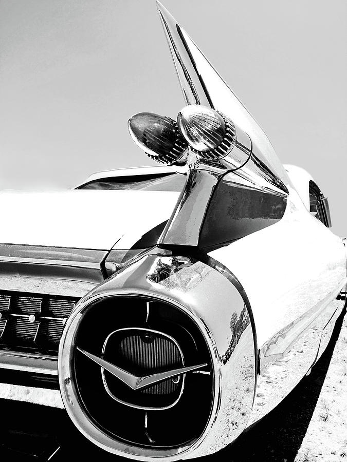 Vintage Cadillac Tail Lights and Fin in Black and White Photograph by Kelly Hazel