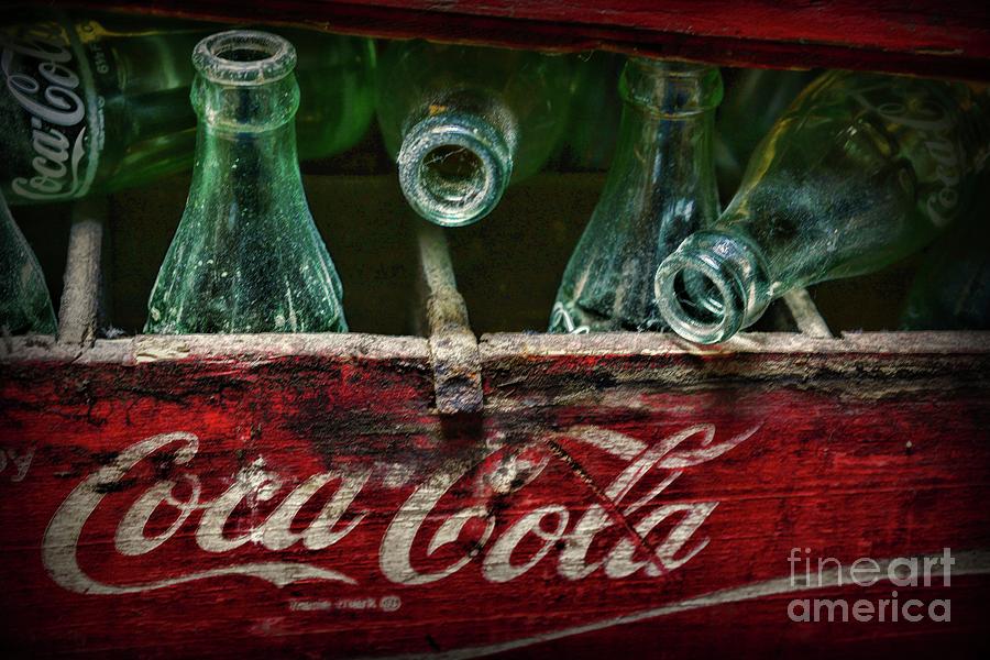 Vintage Coca Cola Bottles very dusty Photograph by Paul Ward