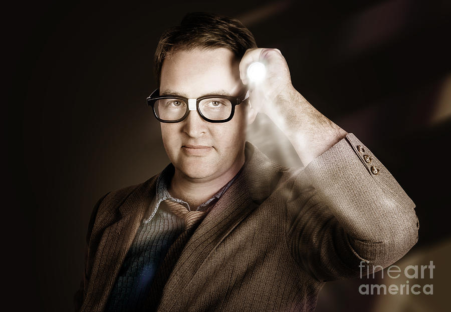 Vintage detective businessman holding search light Photograph by Jorgo Photography