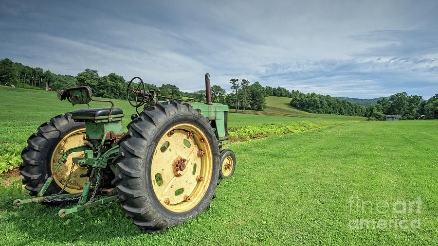 Vintage Farm Tractor in the Field Photograph by Edward Fielding