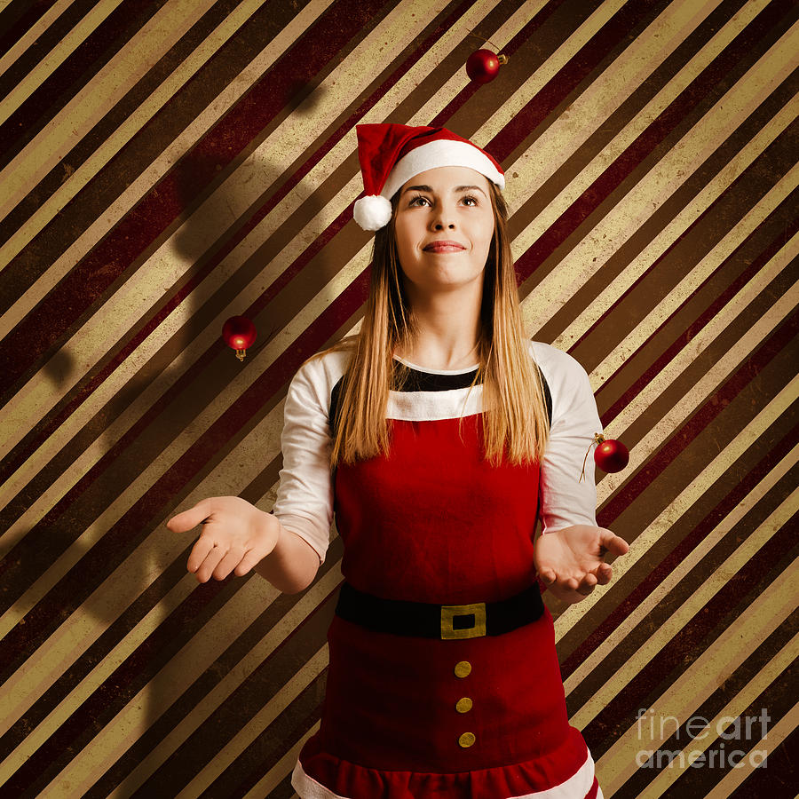 Vintage female elf juggling christmas decorations Photograph by Jorgo Photography