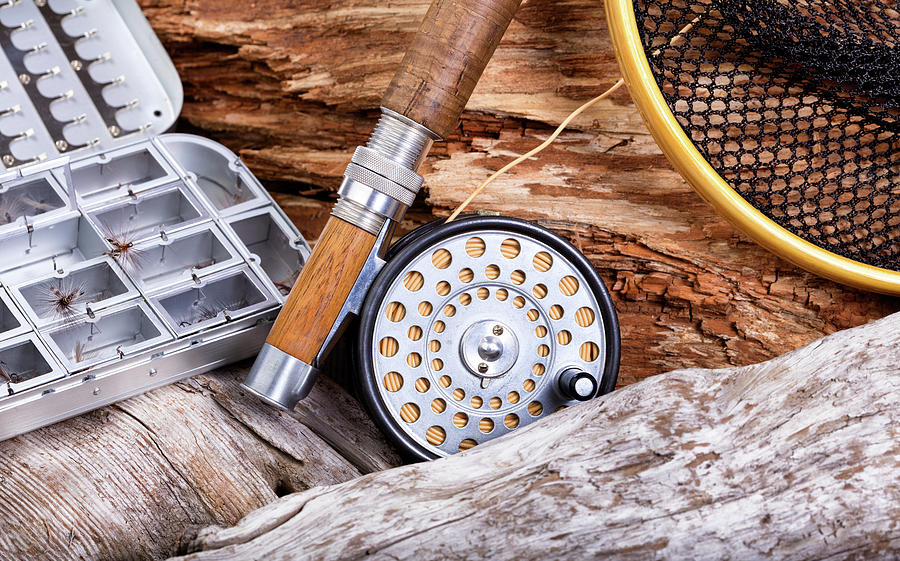 Vintage Fly Fishing Outfit And Gear On Rocks And Wood Background Photograph
