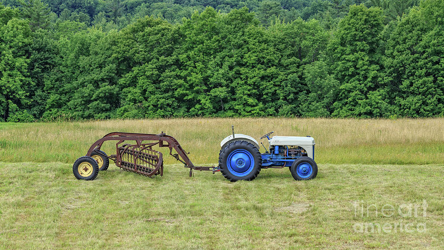 Vintage Ford Blue and White Tractor on a Farm Photograph by Edward Fielding