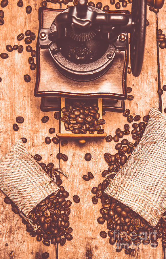 Vintage grinder with sacks of coffee beans Photograph by Jorgo Photography
