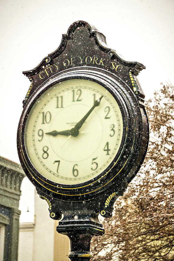 Vintage Historic Street Clock With Snow Falling In Winter Photograph by Alex Grichenko