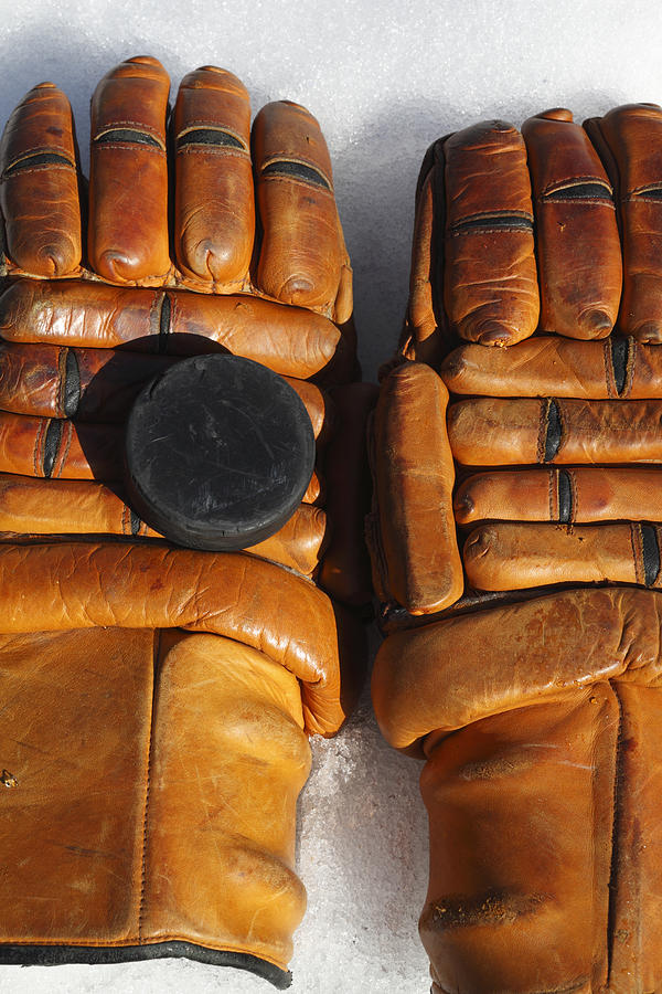 Vintage ice hockey gloves and puck Photograph by Ulrich Kunst And Bettina  Scheidulin - Fine Art America