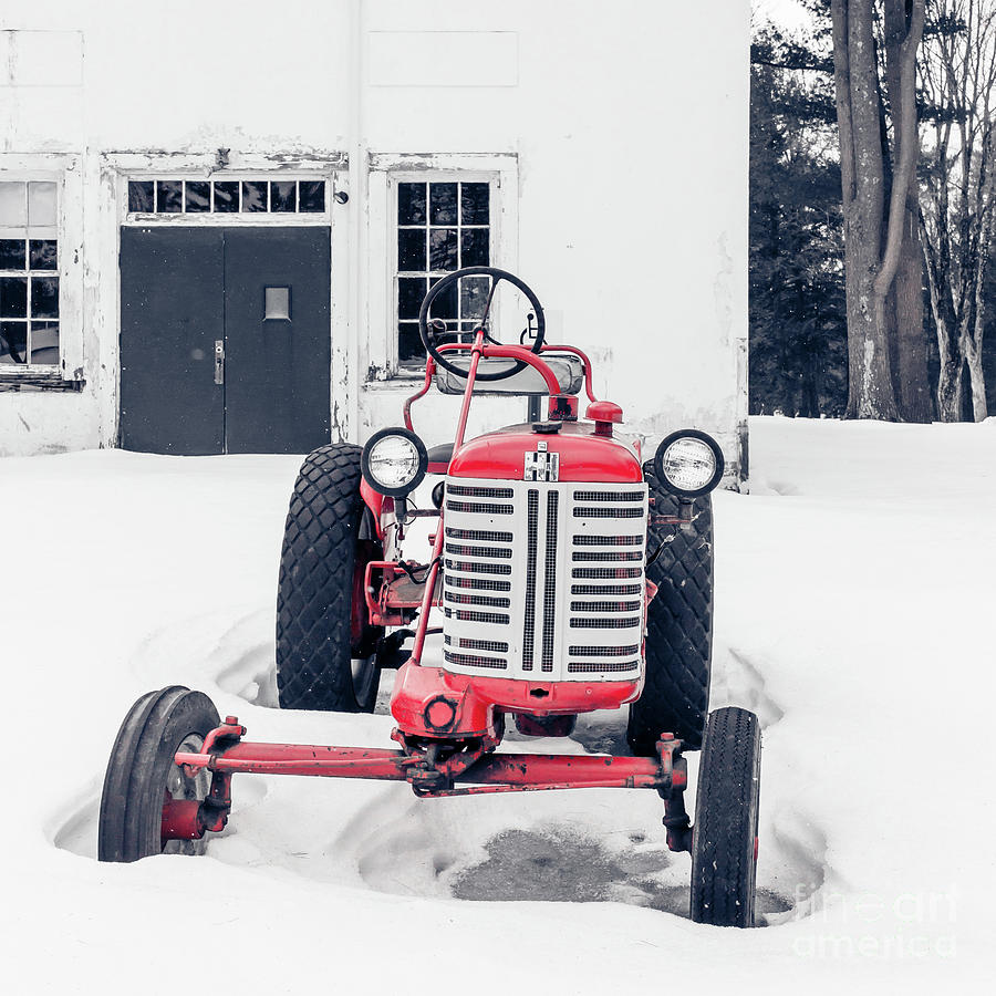 Vintage International Harvester Antique Tractor in the Snow Photograph by Edward Fielding