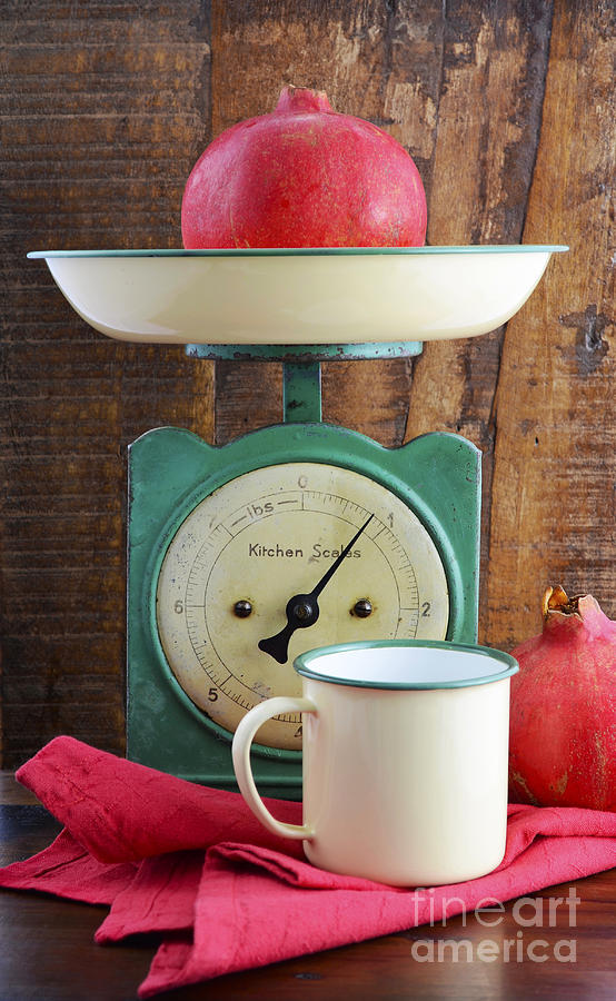 Vintage kitchen scales and tin cups and pans Photograph by Milleflore Images
