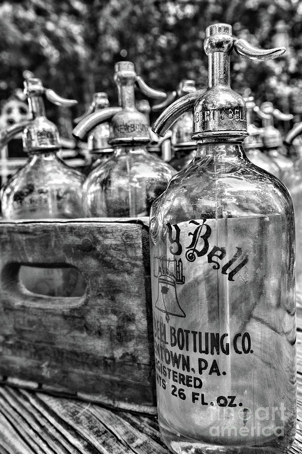Vintage Liberty Bell Seltzer Bottle in black and white Photograph by Paul Ward