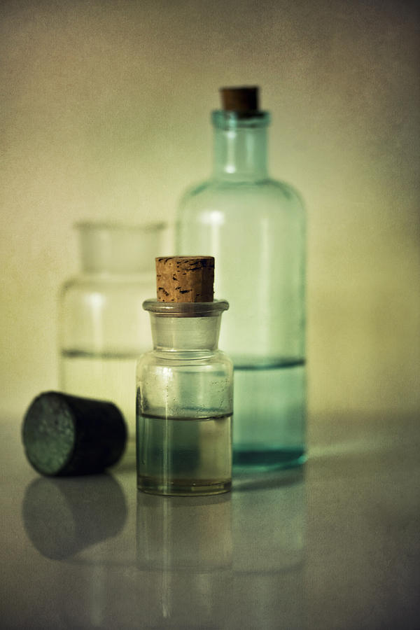 Up Movie Photograph - Vintage medical bottles by Jaroslaw Blaminsky