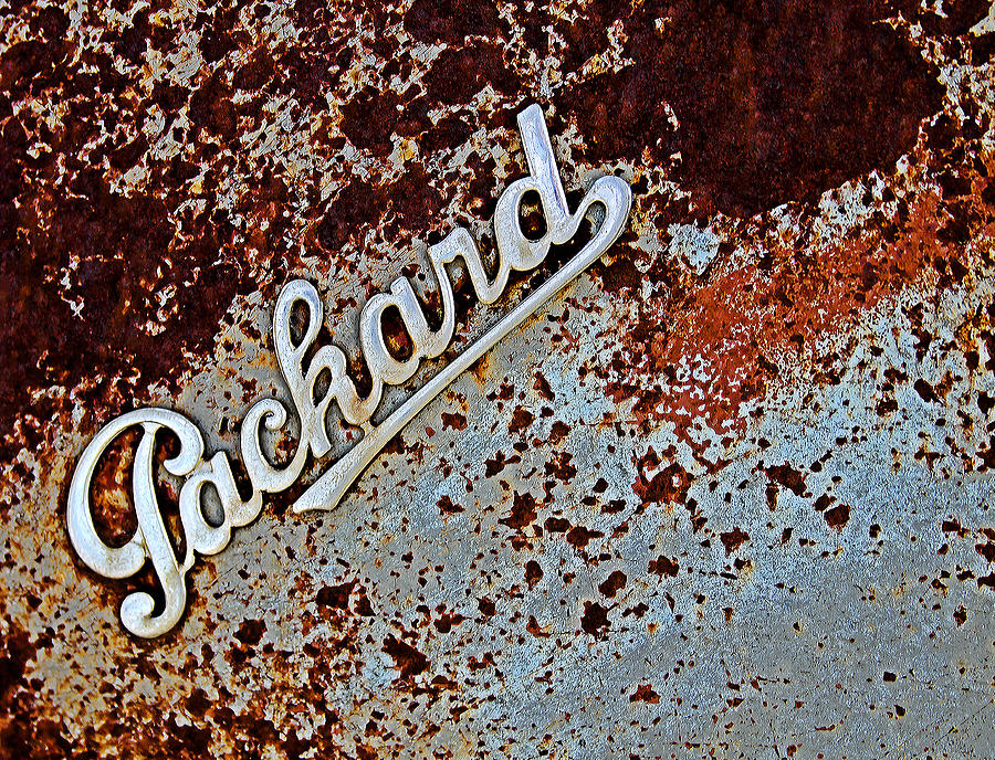 Car Photograph - Vintage Packard Emblem by Tony Grider