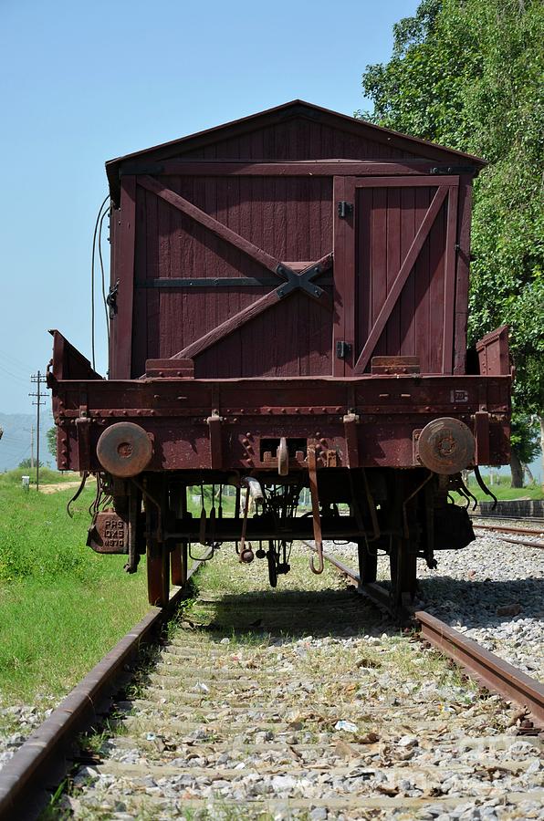 Vintage Pakistan Railways freight car on rails at Railway Museum Islamabad Photograph by Imran Ahmed