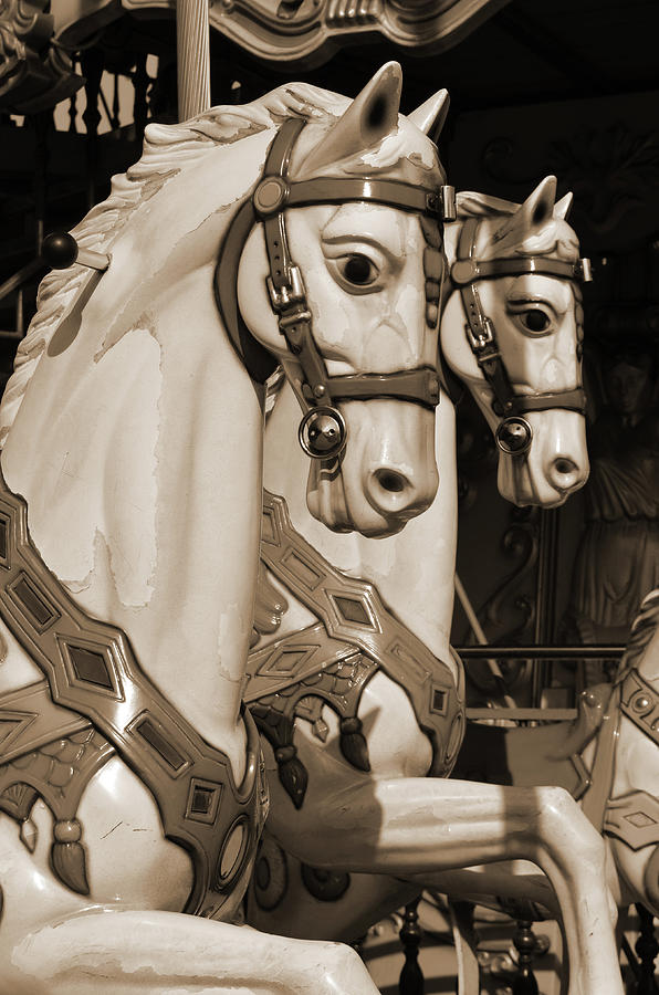 Vintage Parisian Carousel Horses Paris France at the base of Eiffel Tower Sepia Photograph by Shawn OBrien