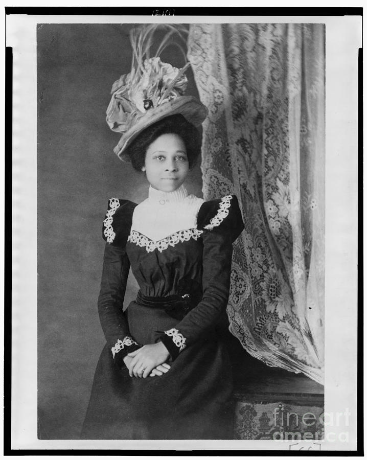 Vintage Portrait of young colored lady wearing hat Photograph by Vintage Collectables