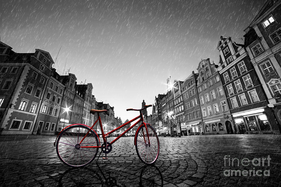 Vintage red bike on cobblestone historic old town in rain in Wroclaw Photograph by Michal Bednarek